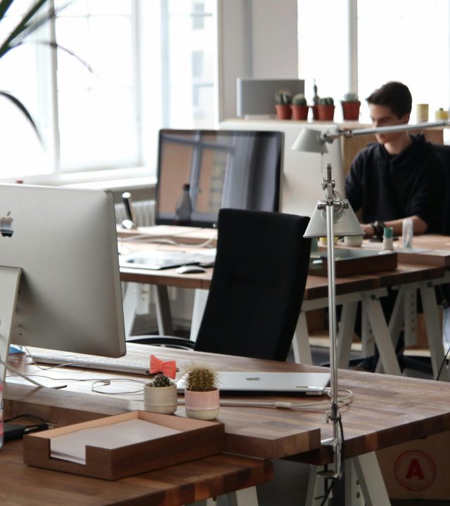 pexels-photo-380769-380769 Open-plan office with modern decor and natural lighting, ideal for productivity.
